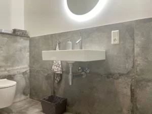 Haus im Haus – Luxuriöse, anspruchsvoll ausgestattete Erdgeschosswohnung mit zwei Wohnbereichen!
